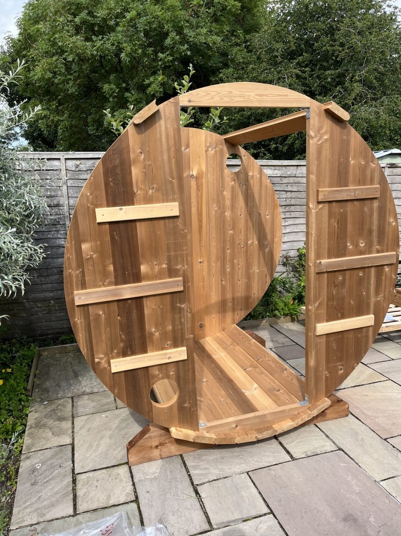 barrel sauna construction in garden