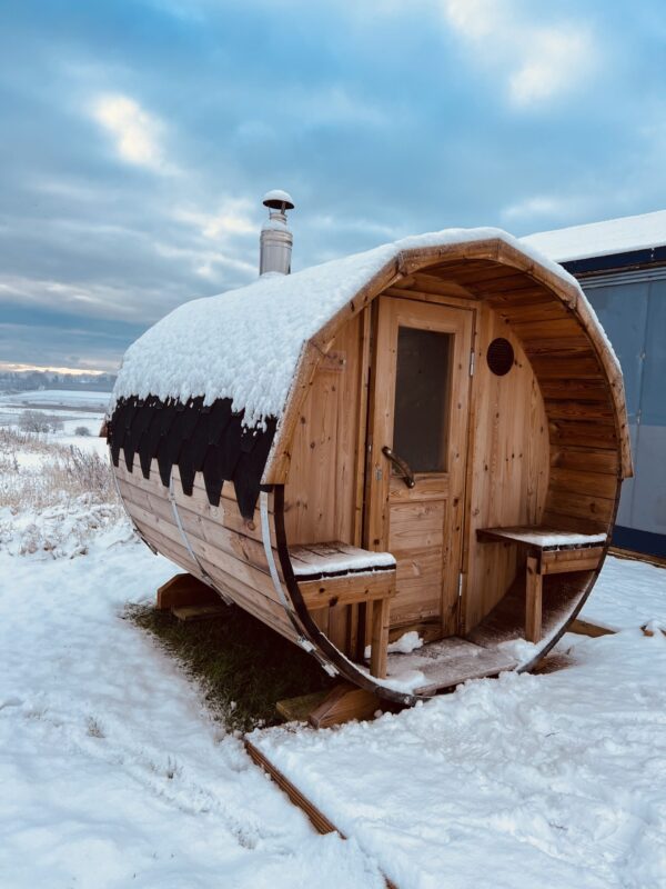 barrel sauna in snow