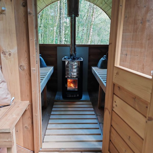 barrel sauna interior with harvia heater