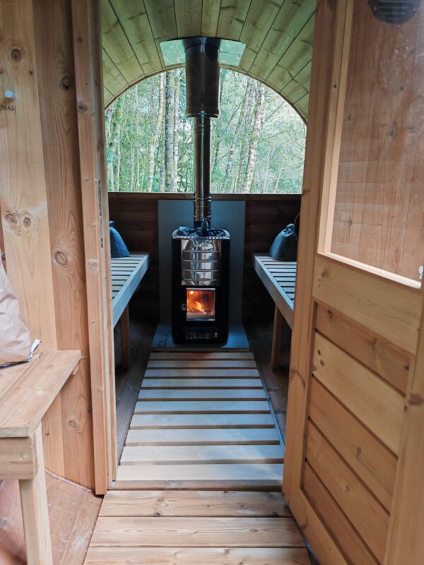 barrel sauna interior with harvia heater
