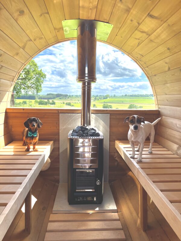 barrel sauna interior with harvia wood burning heater