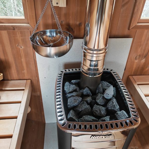 barrel sauna interior with harvia heater