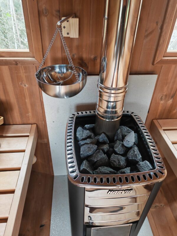 barrel sauna interior with harvia heater