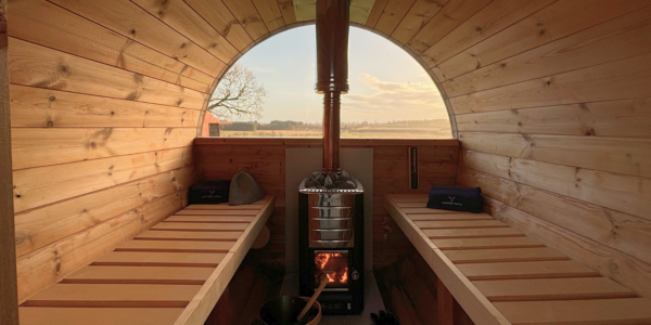 barrel sauna interior with heater